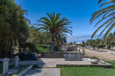 SWAKOPMUND, NAMIBIA-DECEMBER 25,2023: Graves in the cemetery of Swakopmund on the edge of the Namib Desert  clipart