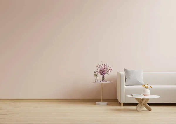 stock image Cream sofa with table on light pink wall and wooden flooring.3d rendering