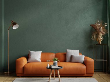 Oturma odasında deri kanepe ve dekorasyon odası boş yeşil duvarda.