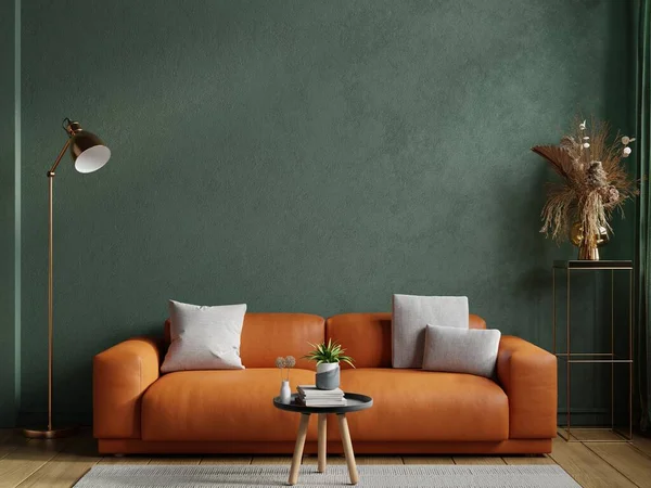 Oturma odasında deri kanepe ve dekorasyon odası boş yeşil duvarda.