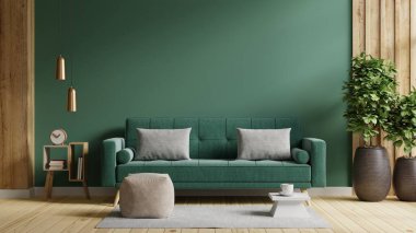 Wall mockup in dark tones with green sofa and decor in living room.3d rendering