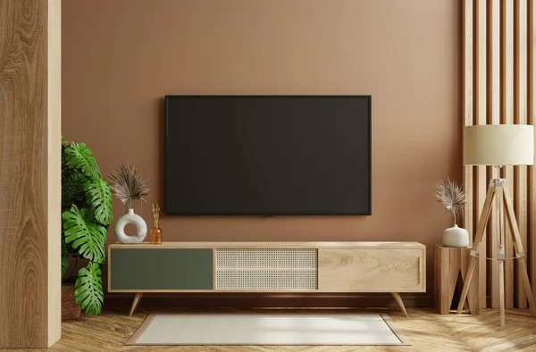 LED TV on the wood cabinet in living room,minimal design.3d rendering