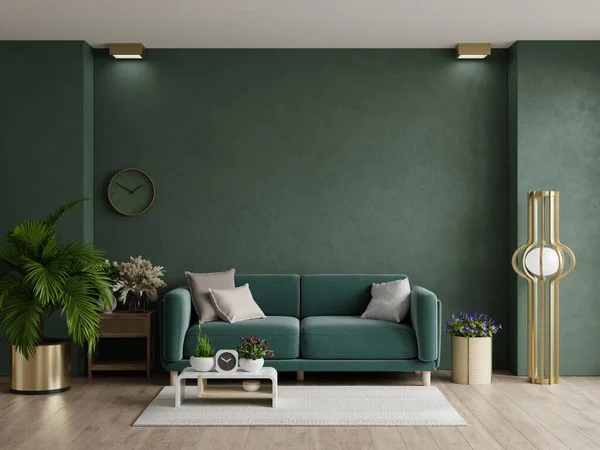 緑のソファと空の暗い緑の壁の背景に装飾部屋と居心地の良い現代的なリビングルームのインテリア — ストック写真