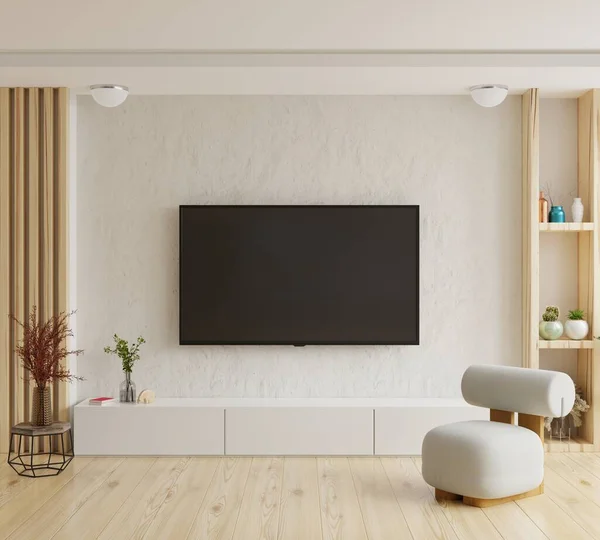 在家里室内用扶手椅和白色水泥墙装饰的电视模型 — 图库照片