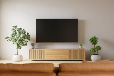 Oturma odasındaki dolaba beyaz televizyon monte edilmiş. Deri kanepe ve en az 33D tasarım.