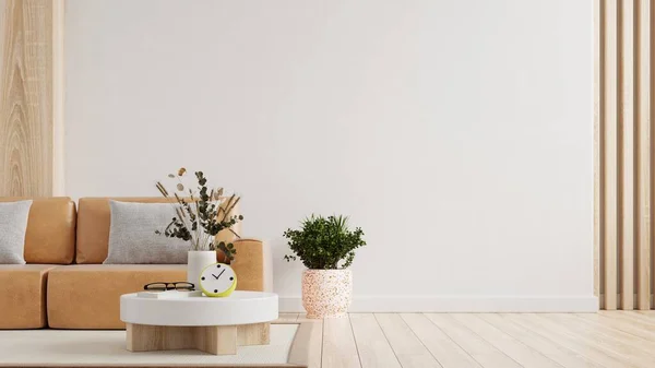 stock image Living room wall mockup with leather sofa and decor on white background.3d rendering