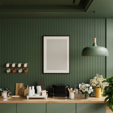 Mutfağın içindeki poster çerçevesini ve aksesuarları koyu yeşil ahşap kaplamalı arka plan 33D işlemeli.