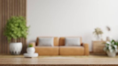 Bulanık oturma odasındaki ahşap masa. Deri kanepe ve dekorasyon minimal.3d.