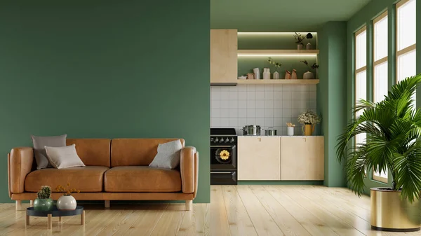 キッチンの後ろにある革のソファと暖かいトーンでリビングルームのインテリア緑の壁のモックアップ — ストック写真