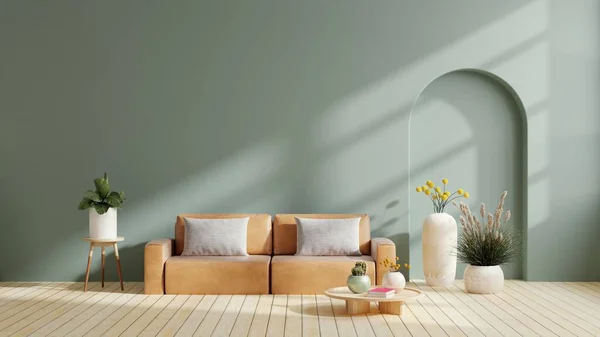 Modern minimalist interior with leather sofa on empty dark green color wall background.3d rendering