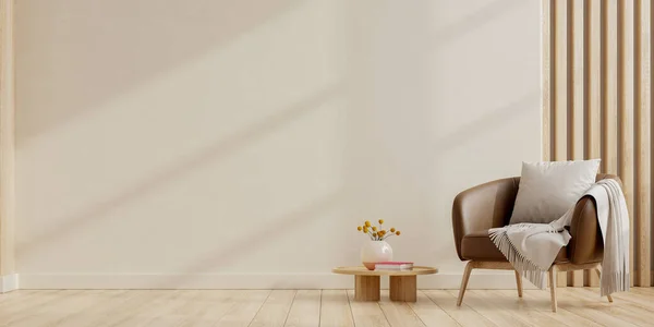 Modern minimal interior with an leather armchair on empty cream color wall background.3d rendering