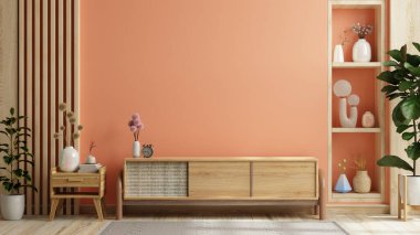 Şeftali rengi duvar boyalı televizyonlar için dolabı olan şeftali tüyü odasının modern iç mimarisi.