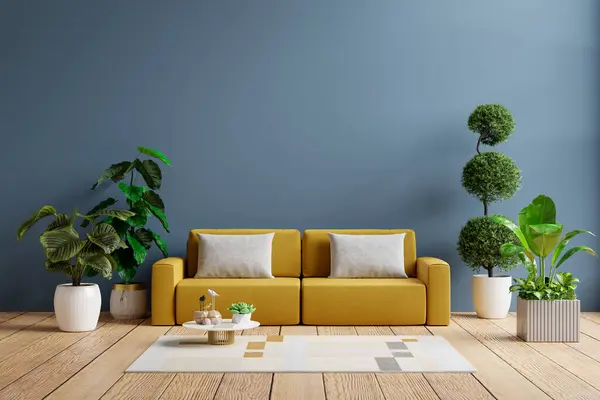 モダンなリビングルームは 空のダークブルーの壁の背景に黄色のソファーを持っています 3Dレンダリング ロイヤリティフリーのストック写真
