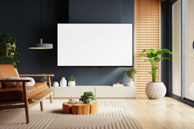 Televizyon odasında geniş ekran, rahat deri koltuklar ve dingin bir atmosfer için yemyeşil bitkiler sergilenen minimalist bir tasarım sergileniyor.