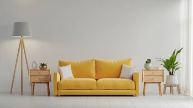 Sarı kanepe lamba ve bitkiyle dolu bir odada. Kanepe duvarın karşısında.