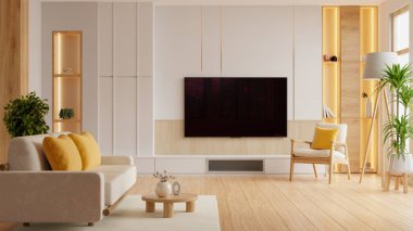 Boş oturma odası, beyaz duvarlı oturma odasında kanepe ve koltukla döşenmiş bir televizyon duvarı.