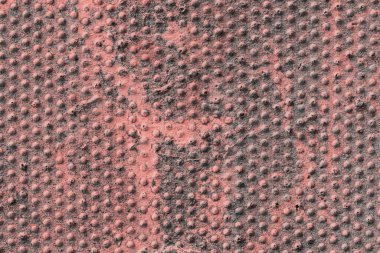 Yakından yumru desenli beton bir doku.