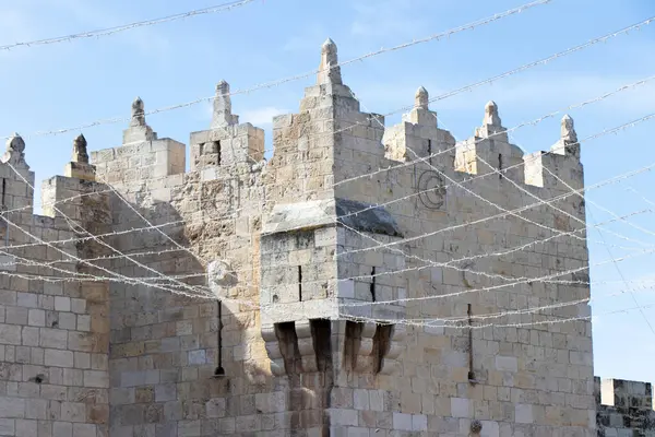 Castle walls of the old city of Jerusalem. Decorating the city of Jerusalem with lights in preparation for Ramadan.