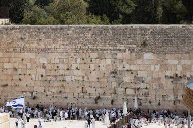 Praying at the Western Wailing Wall of Ancient Temple. Jerusalem, Israel. clipart