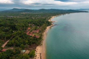 Aerial view of the sand beach with dark rocks in Phu Quoc Island, Vietnam