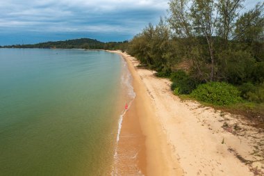 Aerial view of the sand beach with dark rocks in Phu Quoc Island, Vietnam