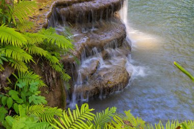 Huay Mae Khamin Waterfall in the rainforest in Si Nakharin National Park, north of Kanchanaburi, Thailand clipart