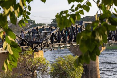 The railway bridge on the historical Kwai River in Kanchanaburi, Thailand clipart