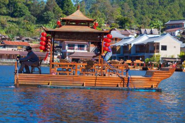 Chinese village of Ban Rak Thai with tea plantations and a lake, Thailand clipart