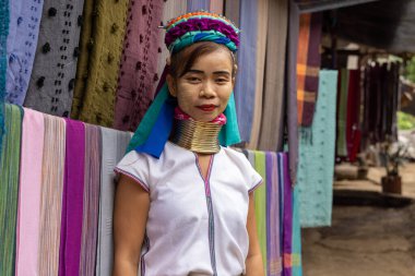 Long-necked women in Kayan village, northern Thailand clipart