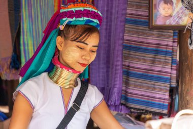 Long-necked women in Kayan village, northern Thailand clipart