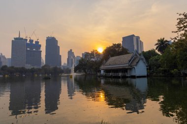 Evening in Lumpini Park, Bangkok clipart