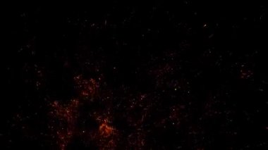 Bunaltıcı şenlik ateşi kıvılcımlar çıkardı. ateş parçacıkları siyah arkaplanda
