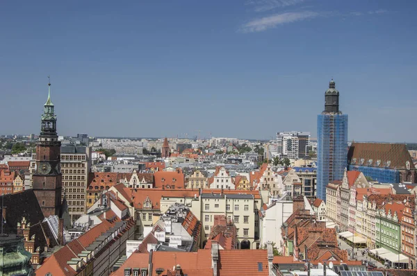 stock image Wroclaw's old town, roofs of tenement houses and the Market Square on a sunny summer day.