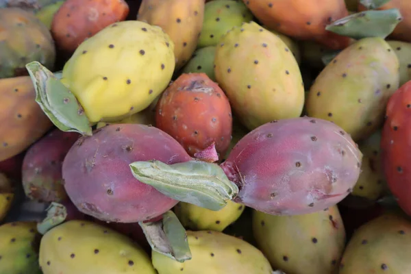 Bright color prickly pear fruit, delicious ripe fruits in the market. Ripe fruits of prickly pear, fruits of the south of Italy