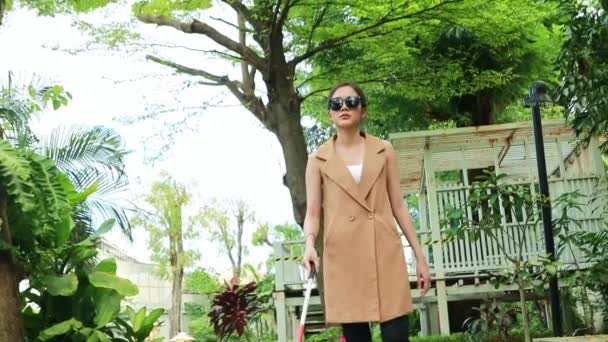 Blind Asian Woman Needs Fresh Air Ozone Plants Walks Slowly — Stock Video
