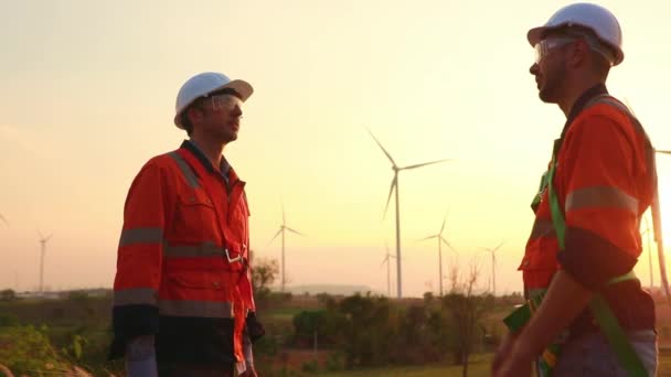 Teamwork Two Caucasian Technicians Inspect Stands Analyzing Wind Power Station — Video Stock