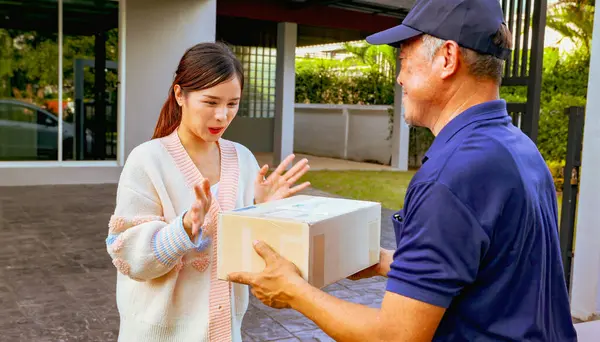 Wow ! : Female customer ordered products online and stood receive box of products from male employee who delivered them to her door she was happy receive the items on time and on the appointed day.