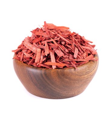 Red Sandalwood incense chips in wooden bowl, isolated on white background. Sanderswood, rubywood or red saunders clipart