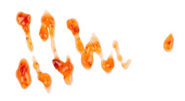 Kayısı kalınlığında bir çiseleme, beyaz arka planda izole edilmiş. Kayısı reçeli, sos, krema. Üst görünüm