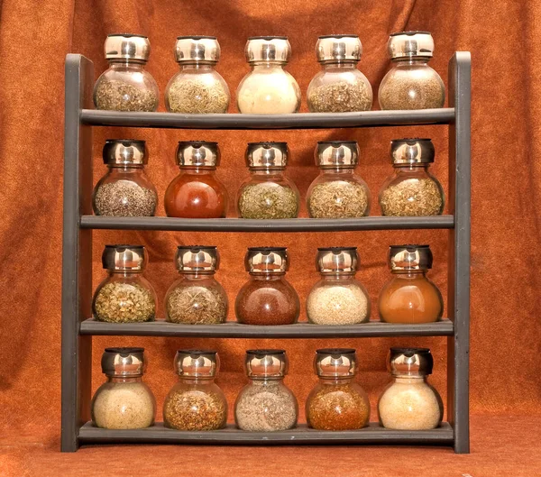 Full rack of kitchen spice jars