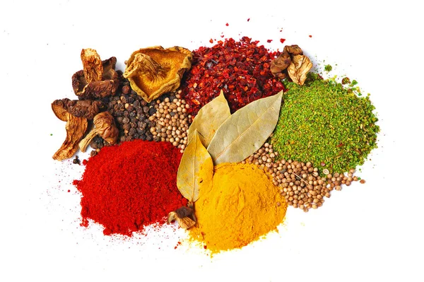 Small Piles Colored Spices Background Royalty Free Stock Images