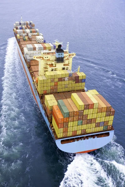 Shipping containers on a moving cargo ship
