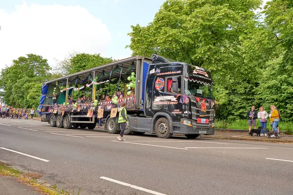 stock image Long truck in a summer carnival parade             