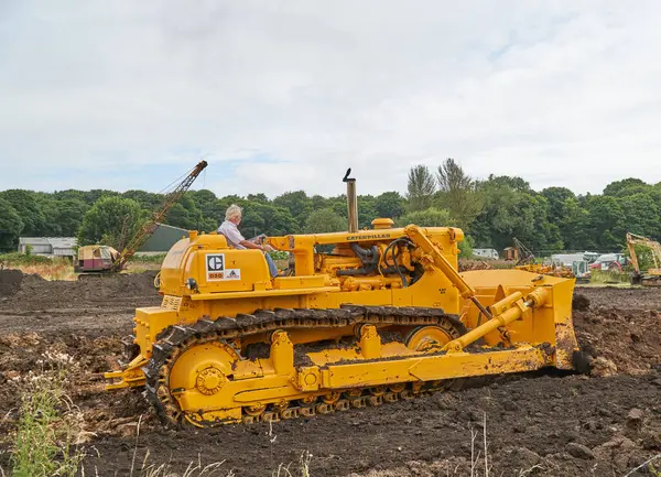 stock image D9 Caterpillar bulldozer pushing soil  