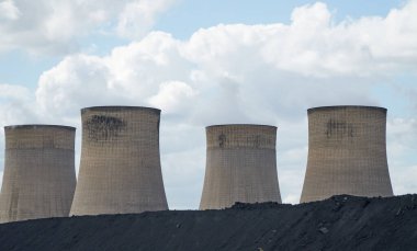 Coal hill in front of a power station at Ratcliffe on Soar, Nottingham, UK clipart