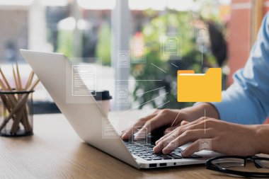 Document management system concept, business man holding folder and document icon software, searching and managing files online document database, for efficient archiving and company data.