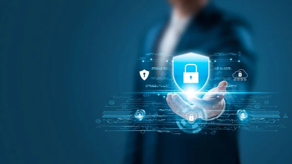 Cybersecurity Privacy data protection concept, businessman holding key protect business and financial data with virtual network connection, security internet access, security encryption.