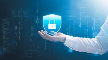 Cybersecurity Privacy data protection concept, businessman holding key protect business and financial data with virtual network connection, security internet access, security encryption.