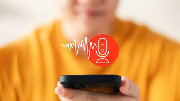 Modern Voice Recording, Hand Holding Microphone Icon on Smartphone Capture Sound, Music, and Voice Messages with this Voice Recording App. Use AI Enabled Internet Search for Easy Access to Information.
