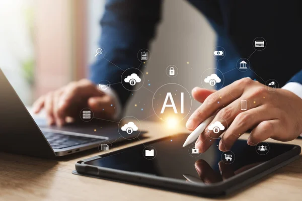 Businessman using artificial intelligence (AI) technology in future business, using artificial intelligence to make business more efficient, IoT, innovation and the future.